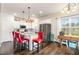 Bright kitchen featuring stainless appliances, granite countertops, and an island with seating at 1828 Wellspring Ct, Graham, NC 27253