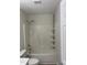 Bathroom with tub and shower combo unit and built-in shelving at 2001 Ballston Pl, Knightdale, NC 27545