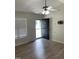 View of front door with a ceiling fan and light wood flooring at 2001 Ballston Pl, Knightdale, NC 27545