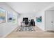 Finished basement featuring a gaming setup, sleek furniture, and contemporary decor at 2006 Nola Ln, Durham, NC 27713