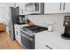 Well-equipped kitchen with stainless steel appliances and ample counter space at 2006 Nola Ln, Durham, NC 27713