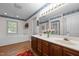 Spacious primary bathroom with double vanity, a large tub, and separate shower at 2127 Somers Ave, Burlington, NC 27215