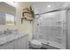 Updated bathroom including a glass-enclosed shower, modern vanity, and stylish decor at 2127 Somers Ave, Burlington, NC 27215