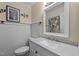 Clean bathroom features white wainscoting and modern fixtures at 2127 Somers Ave, Burlington, NC 27215