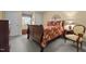Warm bedroom with a sleigh bed, neutral color scheme, and inviting decor at 2127 Somers Ave, Burlington, NC 27215