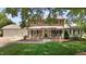 Charming brick home with a welcoming front porch and well-manicured lawn at 2127 Somers Ave, Burlington, NC 27215