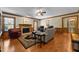Comfortable living room with hardwood floors, fireplace, and classic wood trim at 2127 Somers Ave, Burlington, NC 27215