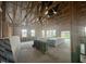 Unfinished interior showing the home's framing, windows, and lumber to give an idea of the size at 223 Norman Ave, Lillington, NC 27546