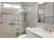 Modern bathroom featuring stylish vanity, tile shower with glass door and convenient grab bars at 225 Midenhall Way, Cary, NC 27513