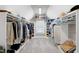 Spacious walk-in closet with shelves and racks at 225 Midenhall Way, Cary, NC 27513