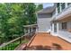 Spacious wooden deck offering views of the house and surrounding landscape at 225 Midenhall Way, Cary, NC 27513