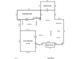 This floor plan displays the layout of the first floor with a kitchen, garage, and composite deck at 225 Midenhall Way, Cary, NC 27513