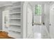 Grand foyer with marble floors, tall ceilings, and abundant natural light at 225 Midenhall Way, Cary, NC 27513