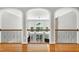 Hallway shows the view of the open living room and staircase at 225 Midenhall Way, Cary, NC 27513