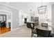 Bright, modern kitchen with a center island and stainless steel appliances at 225 Midenhall Way, Cary, NC 27513