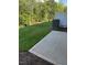 Backyard featuring grass and a concrete patio at 2299 Bay Minette Sta # 537, Apex, NC 27502