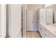 Stylish bathroom featuring wood-look flooring, a vanity, and a door into the shower area at 2299 Bay Minette Sta # 537, Apex, NC 27502