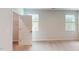 Spacious bedroom featuring dual windows for natural light and a closet with shelving at 2299 Bay Minette Sta # 537, Apex, NC 27502