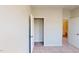 Bright bedroom features neutral walls and carpet and includes a closet and an attached bathroom at 2299 Bay Minette Sta # 537, Apex, NC 27502