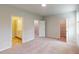 Spacious bedroom with connecting bathroom and closet entrances and neutral finishes at 2299 Bay Minette Sta # 537, Apex, NC 27502