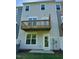 Back exterior of home showcasing deck space and yard at 2299 Bay Minette Sta # 537, Apex, NC 27502