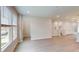 Open living area with hardwood floors and natural light at 2299 Bay Minette Sta # 537, Apex, NC 27502