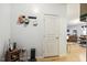 Entryway with storage and a view into the dining room, offering a glimpse of the home's layout at 2410 Kinglass Dr, Fuquay Varina, NC 27526