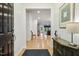 Bright foyer with hardwood floors, leading into an open-concept living area at 2410 Kinglass Dr, Fuquay Varina, NC 27526