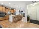 Spacious kitchen with a large center island, stainless steel appliances, and ample cabinet space at 2410 Kinglass Dr, Fuquay Varina, NC 27526