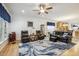 Cozy living room with hardwood floors and plenty of natural light at 2410 Kinglass Dr, Fuquay Varina, NC 27526