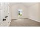 Cozy carpeted bedroom with natural light creating a serene atmosphere at 2507 Belvinwood Dr, Fuquay Varina, NC 27526