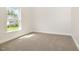 Inviting carpeted bedroom filled with natural light for a warm and welcoming feel at 2507 Belvinwood Dr, Fuquay Varina, NC 27526