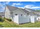 A fenced backyard features healthy green grass and ample sunlight at 2513 Asher View Ct, Raleigh, NC 27606
