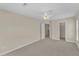 Bright bedroom with two windows, carpeted floors, and neutral paint at 2513 Asher View Ct, Raleigh, NC 27606