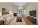 Bright living room with fireplace, vaulted ceilings, and modern decor at 2513 Asher View Ct, Raleigh, NC 27606