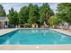 A pristine pool is surrounded by lounge chairs, offering a relaxing oasis at 2513 Asher View Ct, Raleigh, NC 27606