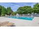 A pristine pool is surrounded by lounge chairs, offering a relaxing oasis at 2513 Asher View Ct, Raleigh, NC 27606