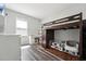 Bedroom with a loft bed, a desk, and vinyl wood-look floors at 2620 Holloway St, Durham, NC 27703