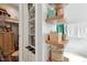 Organized closet with open shelves and ample storage solutions at 2620 Holloway St, Durham, NC 27703