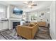 Bright living room with a fireplace, and comfortable seating at 2620 Holloway St, Durham, NC 27703