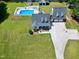 Expansive aerial view of property with swimming pool and outdoor amenities at 2709 Les Paul Ln, Apex, NC 27539