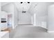 Bonus room with light walls, gray carpet, unique ceiling, and an attached bath at 2709 Les Paul Ln, Apex, NC 27539
