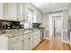 Spacious kitchen with stainless steel appliances, granite countertops, and tiled backsplash at 2709 Les Paul Ln, Apex, NC 27539