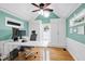 Bright home office features hardwood floors, and built-in storage cabinets at 2709 Les Paul Ln, Apex, NC 27539