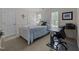 Bedroom with neutral walls, large window, carpeted floor, and basic furnishings at 2901 Ceremonial Ct, Raleigh, NC 27615