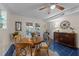 Dining room leading to the backyard with a table for four and natural light at 2901 Ceremonial Ct, Raleigh, NC 27615