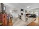 Bright living room with fireplace, comfortable seating, and hardwood floors at 2901 Ceremonial Ct, Raleigh, NC 27615