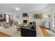Spacious living room with fireplace, comfortable seating, and neutral carpet at 2901 Ceremonial Ct, Raleigh, NC 27615