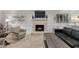 Cozy living room with fireplace and neutral walls at 2901 Ceremonial Ct, Raleigh, NC 27615