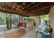 Covered patio with comfortable seating, perfect for outdoor relaxation and entertainment at 2901 Ceremonial Ct, Raleigh, NC 27615